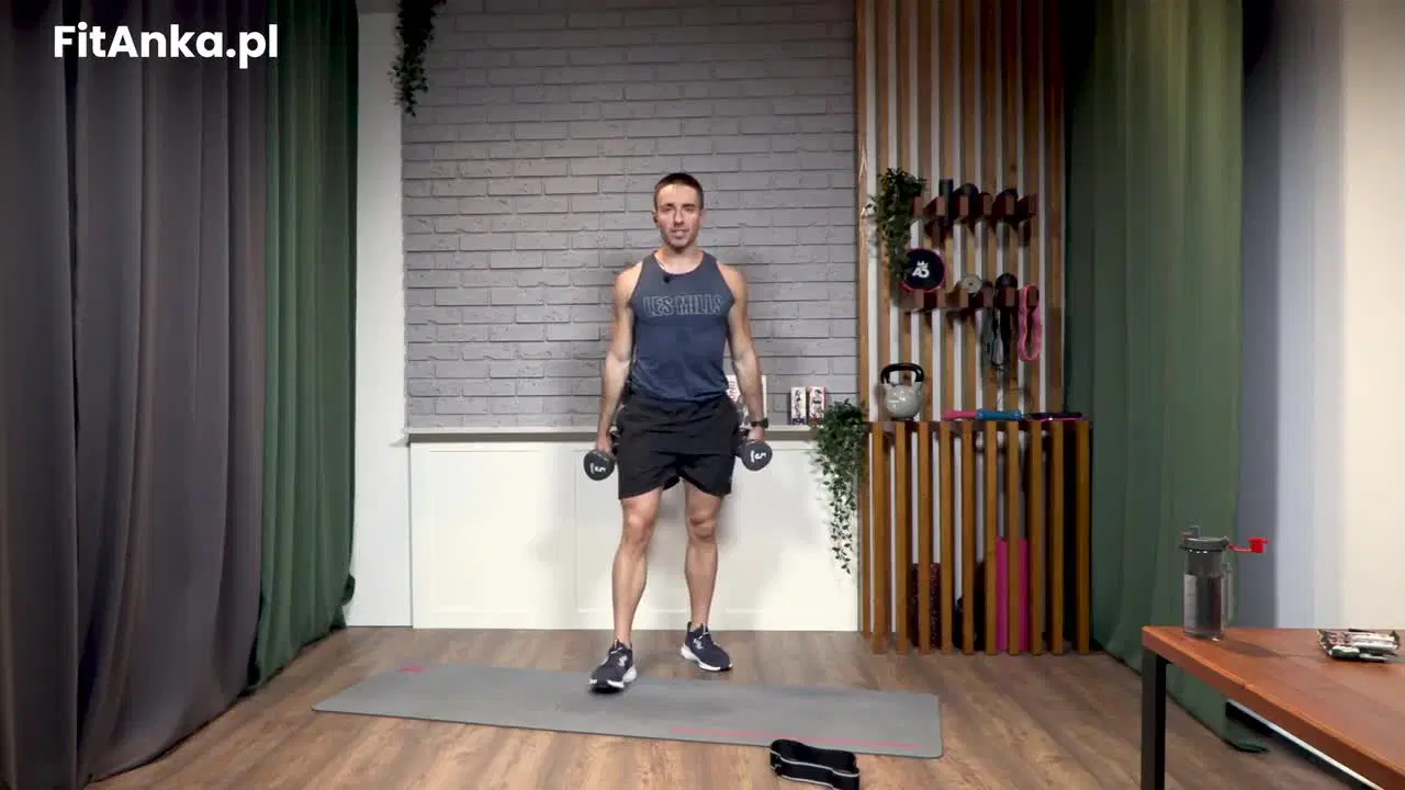 Kadr z treningu CrossFit Kriss - siła i tempo z ciężarkami i gumą hip band