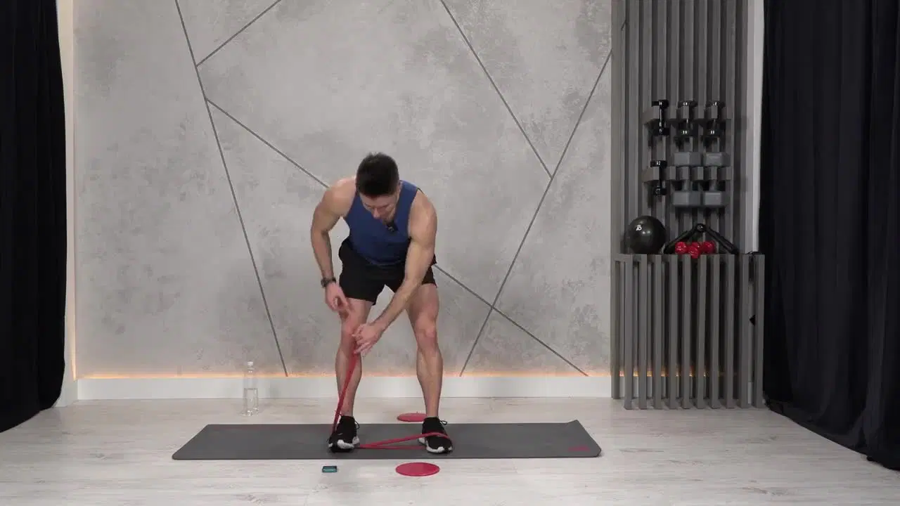 Kadr z treningu Burn and ABS - interwał funkcjonalny z gumą power band i slide dyskami
