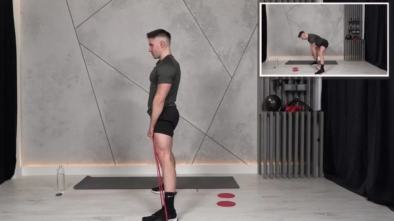 Kadr z treningu Burn and ABS - tempo i stabilizacja z gumą power band i slide dyskami